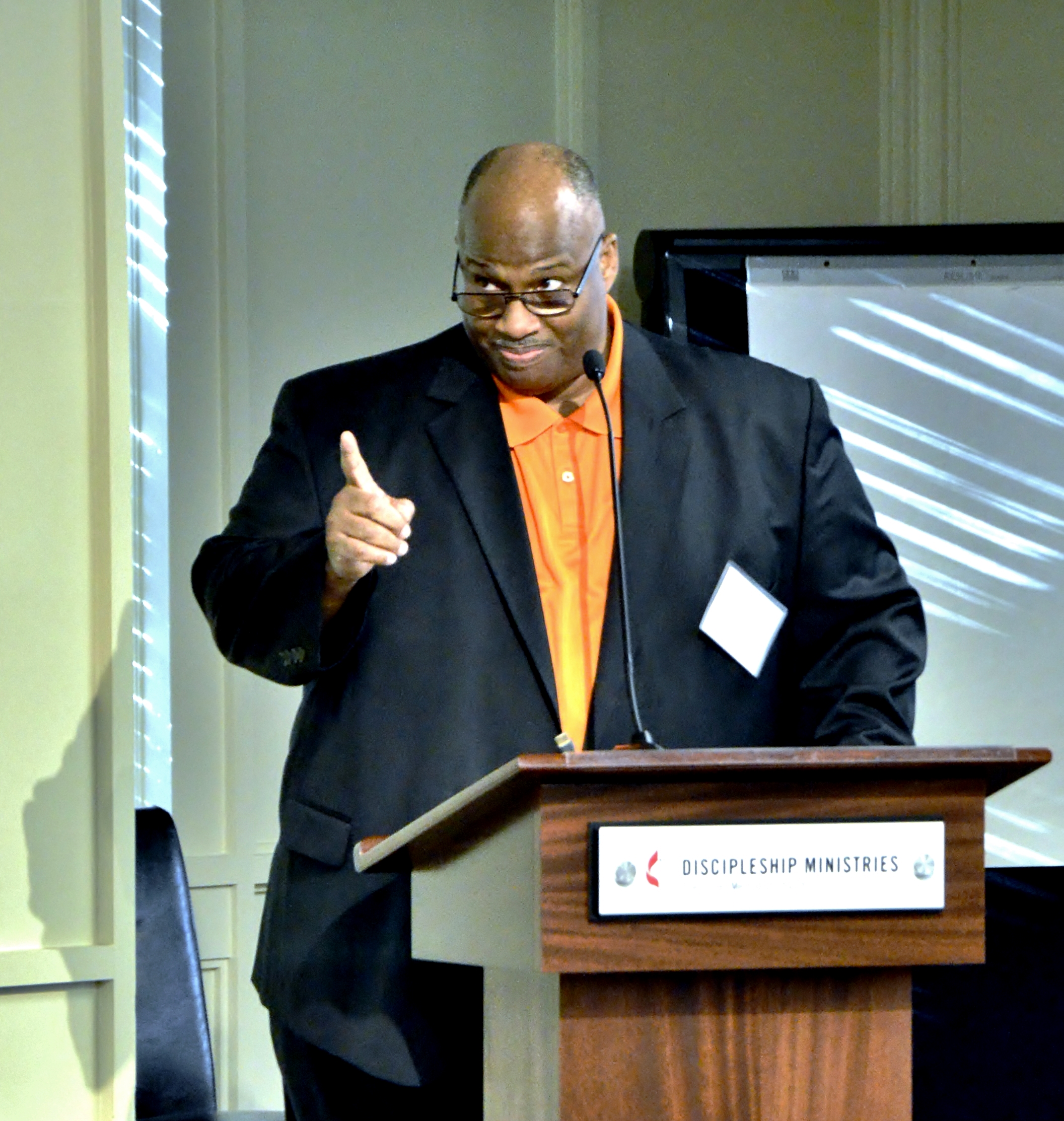 Bishop Darryl B. Starnes Sr. of the African Methodist Episcopal Zion Church leads opening devotion at the North American ecumenical evangelism conference. He encouraged Christians to take a broad approach to evangelism, sharing the good news by word, service and signs. Photo© by Tom Gillem