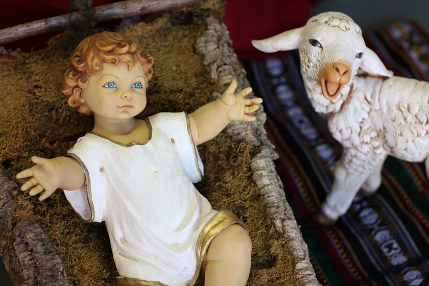 Baby Jesus and lamb nativity figures. Photo by Kathleen Barry, United Methodist Communications