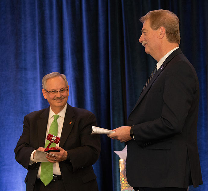 Outgoing President of the United Methodist Council of Bishops Bruce R. Ough (left) prepares to pass the leader&amp;amp;amp;amp;amp;amp;amp;amp;rsquo;s gavel to incoming president Bishop Kenneth H. Carter during a leadership celebration at the council&amp;amp;amp;amp;amp;amp;amp;amp;rsquo;s meeting in Chicago. Photo by Mike DuBose, UMNS.