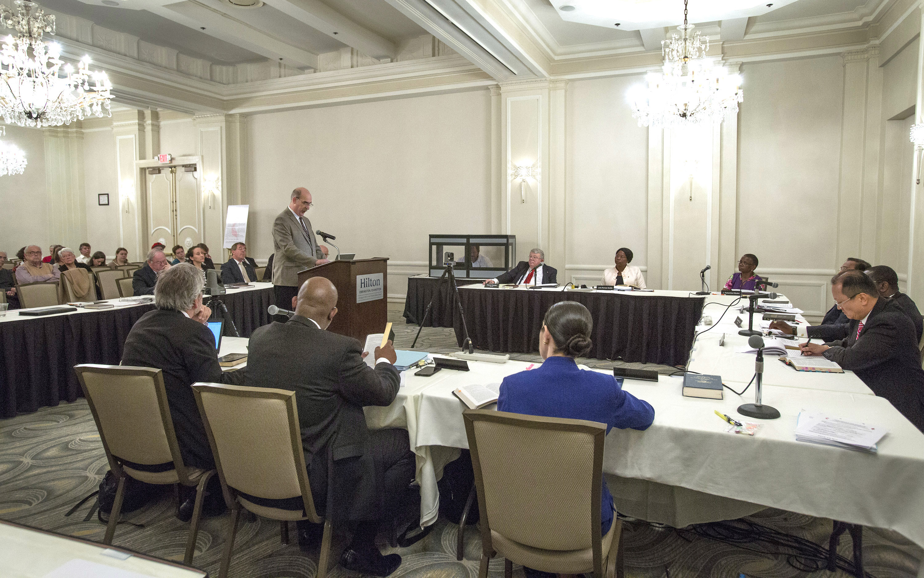 The Rev. Gary George, Commission on General Conference, speaks before members of the United Methodist Judicial Council during a May 22 oral hearing. The court held a special session in Evanston, Ill. The court heard arguments about whether United Methodist organizations, clergy or lay members should be able to submit petitions for the special General Conference in 2019. Photo by Kathleen Barry, UMNS