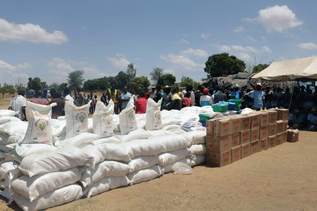 Food hampers are distributed to Cyclone Idai survivors in Ntcheu, Malawi. The United Methodist Church is still assisting remote villages in the region amid the COVID-19 pandemic. Photo by Francis Nkhoma, UM News. 