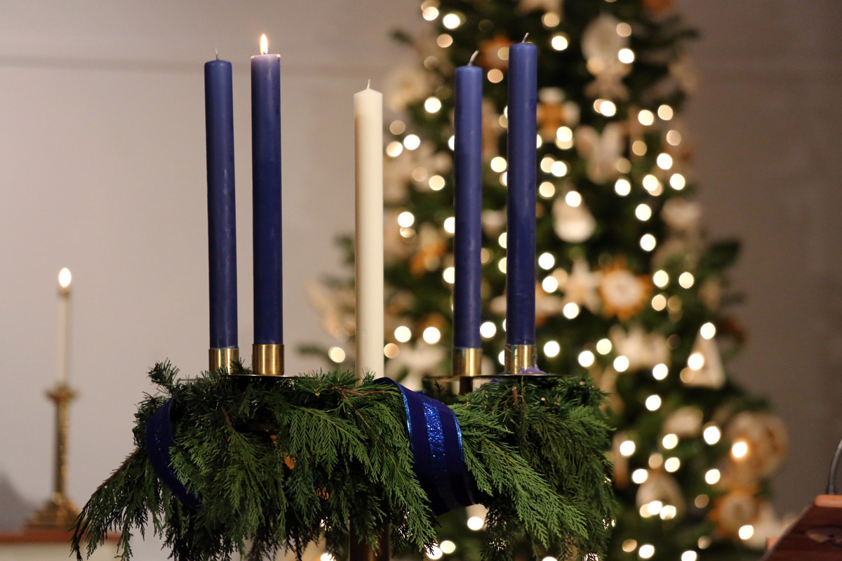 A single lit candle in a wreath signifies the first week of Advent. In the midst of the COVID-19 pandemic and other challenges, United Methodist churches are thinking creatively for the seasons of Advent and Christmas. Photo of Glendale United Methodist Church in Nashville, Tenn., by Steven Kyle Adair, United Methodist Communications.