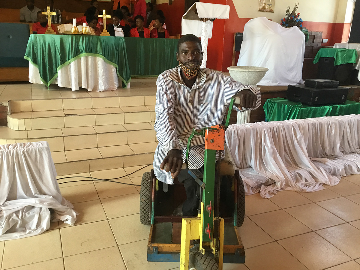 Taurai Mhishi hasn’t let his disability keep him from serving The United Methodist Church in Zimbabwe, where he has worked to clear church grounds for a parking lot at St. Paul United Methodist Church in Harare, Zimbabwe. His servanthood during the pandemic has inspired others to lend a hand. Photo by Priscilla Muzerengwa, UM News.