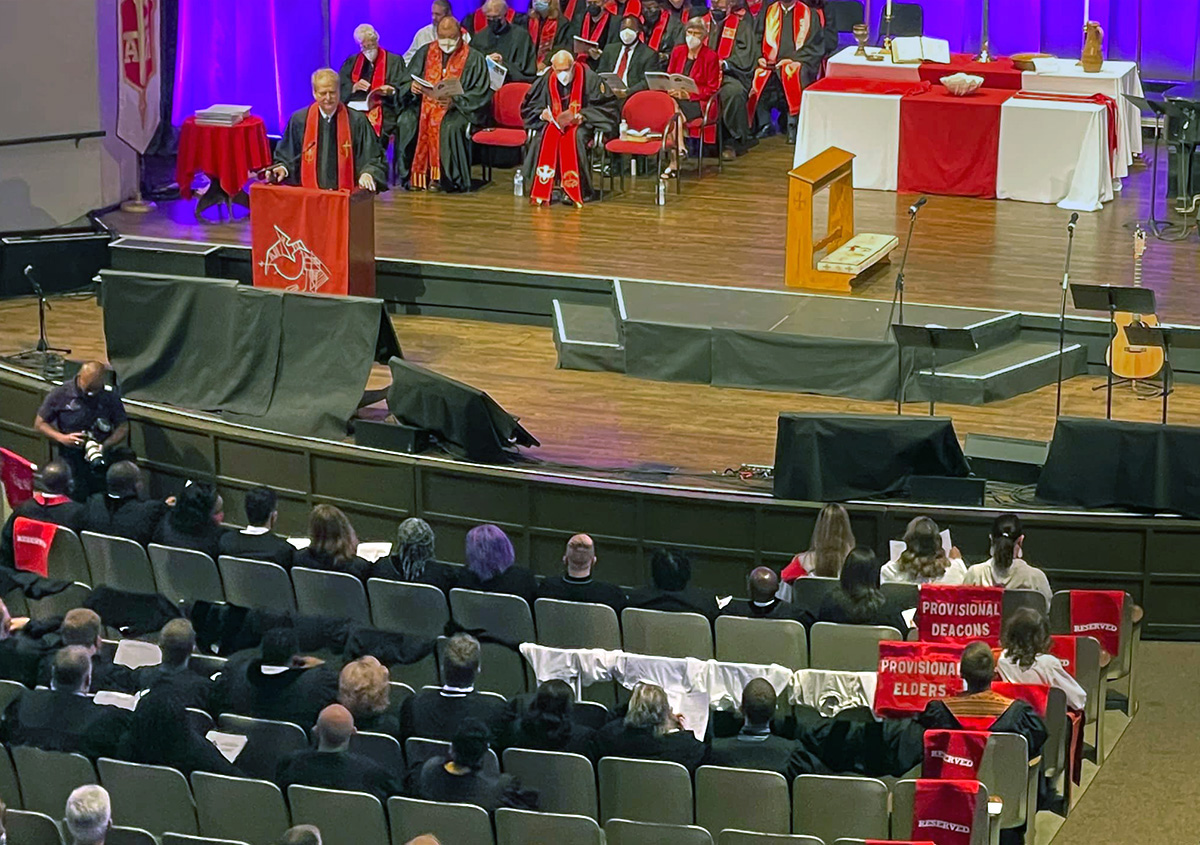 Draped chairs symbolize that Florida Conference candidates for provisional membership — an important step toward ordination as elder or deacon — failed to get approved by the conference clergy session. The controversial decision, made during the conference’s gathering in Lakeland, Fla., illustrated denominational division over LGBTQ inclusion. The decision also altered the June 11 concluding service, where the 16 were to be commissioned. Photo by Esther Rodriguez via Facebook.