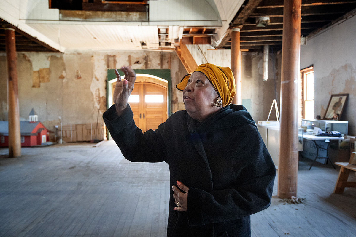 Mary Harris describes her vision for Pickett Chapel, a nearly 200-year-old structure built by slaves as a Methodist church in Lebanon, Tenn. Harris, president of the Wilson County Black History Committee, says about $200,000 so far has been spent to stabilize the building. Photo by Mike DuBose, UM News.