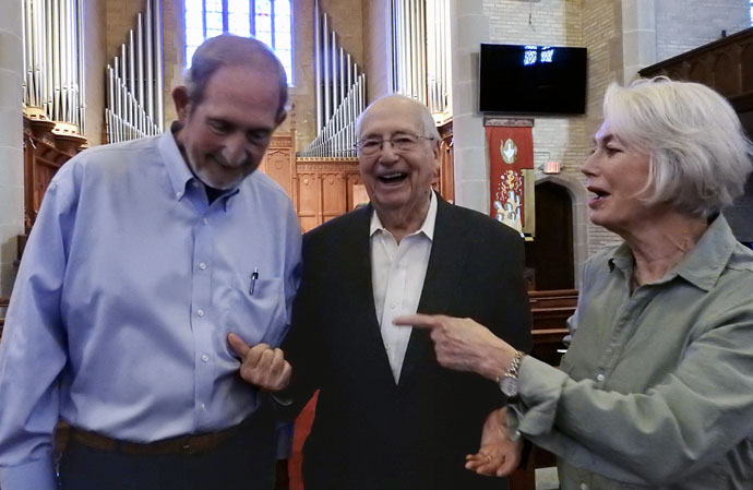 The Rev. Robert Escamilla (center) visits with friends Steve and Nancy Cody after an Oct. 1 worship service at First United Methodist Church of Ada, Okla. Escamilla, 92, serves the church as volunteer minister of evangelism. Photo by Sam Hodges, UM News.