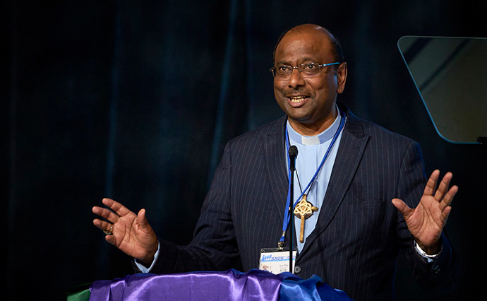 The Rev. Jerry Pillay gives the sermon during morning worship at the United Methodist General Conference in Charlotte, N.C., on April 30. The general secretary of the World Council of Churches, Pillay told conference delegates, "Christian unity matters." Photo by Paul Jeffrey, UM News.