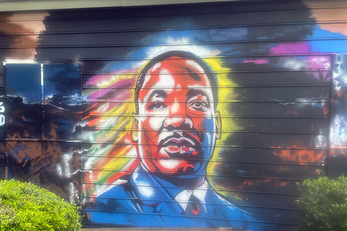 A painting of civil rights leader the Rev. Martin Luther King Jr., created by Manny Blanco, is shown on one of the exterior walls of Hope Chapel, part of the Word on the Street ministry headed by the Rev. Charles DiRico in Charlotte, N.C. Photo by Jim Patterson, UM News.