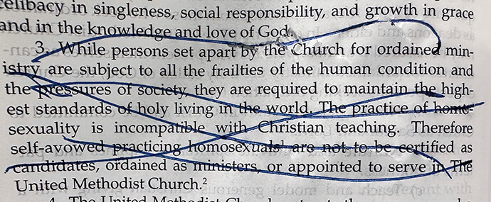 Tom Lee’s copy of the Book of Discipline shows his pen marks through ¶304.3 after delegates at the 2024 General Conference voted to remove language stating the practice of homosexuality is “incompatible with Christian teaching.” Photo courtesy of Tom Lee.