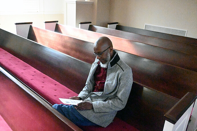 Warren Hendricks waits for Sunday services to begin at Bethany United Methodist Church in Smyrna, Ga., on March, 10. Hendricks, who is not a member of Bethany, attended to see his son sing during the service. Photo by Jim Patterson, UM News.