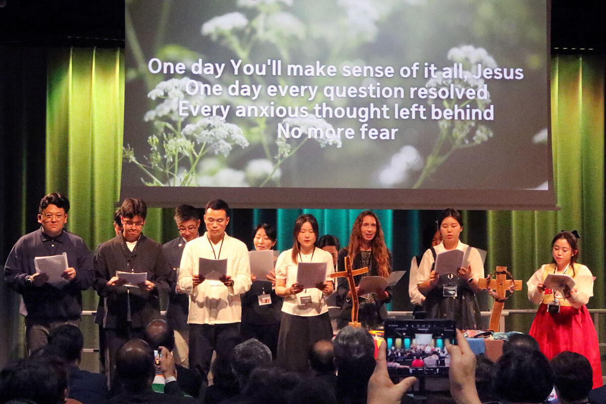 Young Methodists from around the world sing at the Korea Peace Night gathering held Aug. 15 during the World Methodist Conference in Gothenburg, Sweden. More than 250 young adults and Methodist church leaders came together to speak out against wars and racism and call for peace. Photo by the Rev. Thomas E. Kim, United Methodist News.