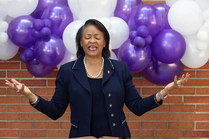 Bishop Sharma D. Lewis prays during the service of dedication for the renovated student center at Gammon Theological Seminary in Atlanta. Lewis is a graduate of Gammon and serves on the institution’s board of directors. Photo by Mike DuBose, UM News.