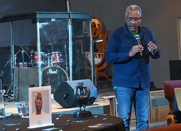The Rev. Michael L. Bowie Jr., national executive director of The United Methodist Church’s Strengthening the Black Church for the 21st Century, speaks Oct. 5 during the biennial National Summit on Mass Incarceration and Social Justice in Kansas City, Mo. The photo is of the late Marcellus Williams, who was executed Sept. 24 in Missouri. Photo by Jim Patterson, UM News.