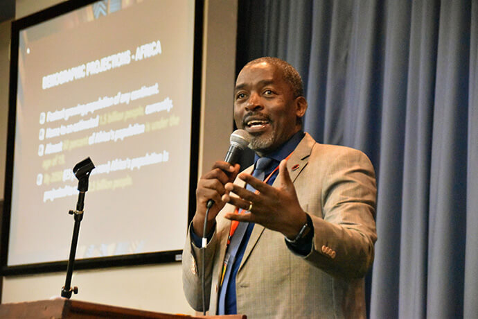 Africa University’s Vice-Chancellor Peter Mageto speaks to BMCR members about the challenges but also opportunities facing the United Methodist-supported institution, which was affected by the recent suspension of USAID funding. The group met March 19-21 at Holman United Methodist Church in Los Angeles. Photo by John W. Coleman, UM News.