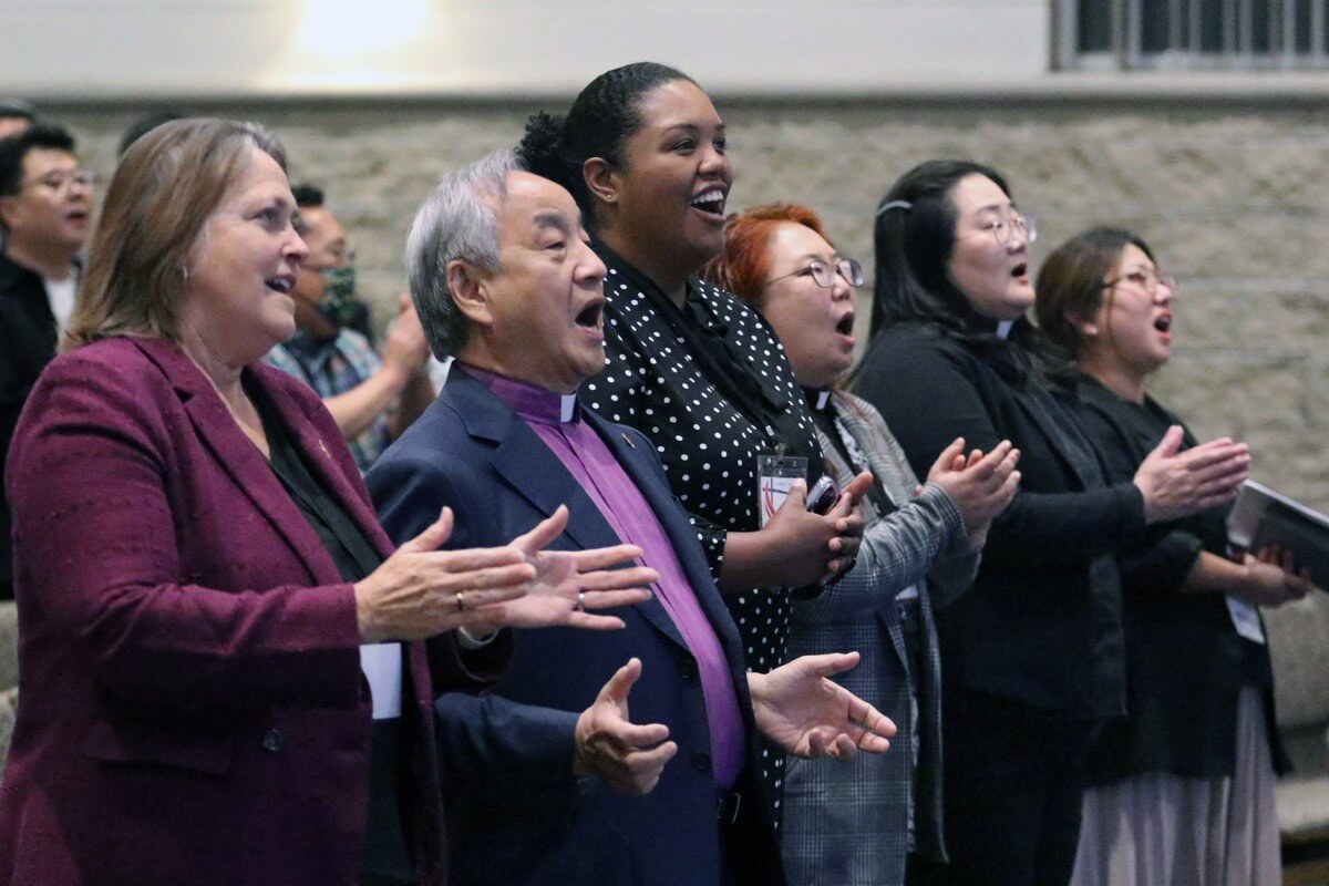 Participants sing during opening worship at the 2023 special session of the National Association of Korean American United Methodists at Korean First United Methodist Church in Wheeling, Ill., on Oct. 2. The Southeastern Jurisdiction has scheduled its first Asian American Ministers Gathering in May to bring clergy together for fellowship, resources and ministerial support. Pictured from left are Bishops Dottie Escobedo-Frank and Hee-Soo Jung, Dana Lyles and the Revs. MiRhang Baek, Prumeh Lee and Ju-Yeon Julie Jeon. File photo by the Rev. Thomas E. Kim, UM News.