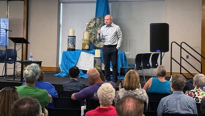 The Rev. Gary Mason, a Methodist minister who has played an integral role in the Northern Irish peace process, speaks about confronting Christian nationalism on April 5 at the Peace Conference at Lake Junaluska. He said the U.S. is not the only place dealing with Christian nationalism. Photo by Crystal Caviness, United Methodist Communications.