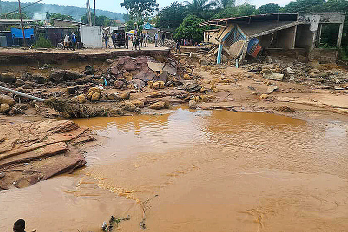 Debris from what was a bridge over the Ndjili River is shown in the aftermath of severe flooding in Kinshasa, Congo. With the bridge washed away, worshippers are unable to reach Lemba Imbu United Methodist Church, which also was damaged by floodwaters following torrential rains on April 5. Photo by the Rev. Fiston Okito, UM News.