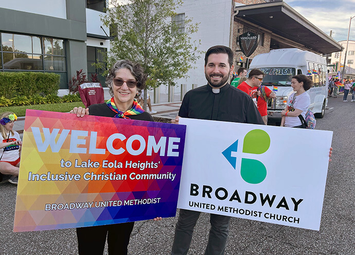 The Rev. Rushing Kimball (right) stands with Dorothy Robasser, Broadway United Methodist’s lay leader and a certified lay speaker, at the Orlando, Fla., Pride Parade in October 2024. Photo courtesy of Kimball, Broadway United Methodist Church. 