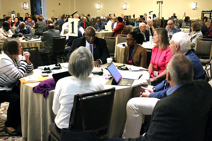 Bishops and ecumenical staff engage in small-group discussions about United Methodists’ relationships with fellow people of faith. Photo by Rick Wolcott, Council of Bishops.