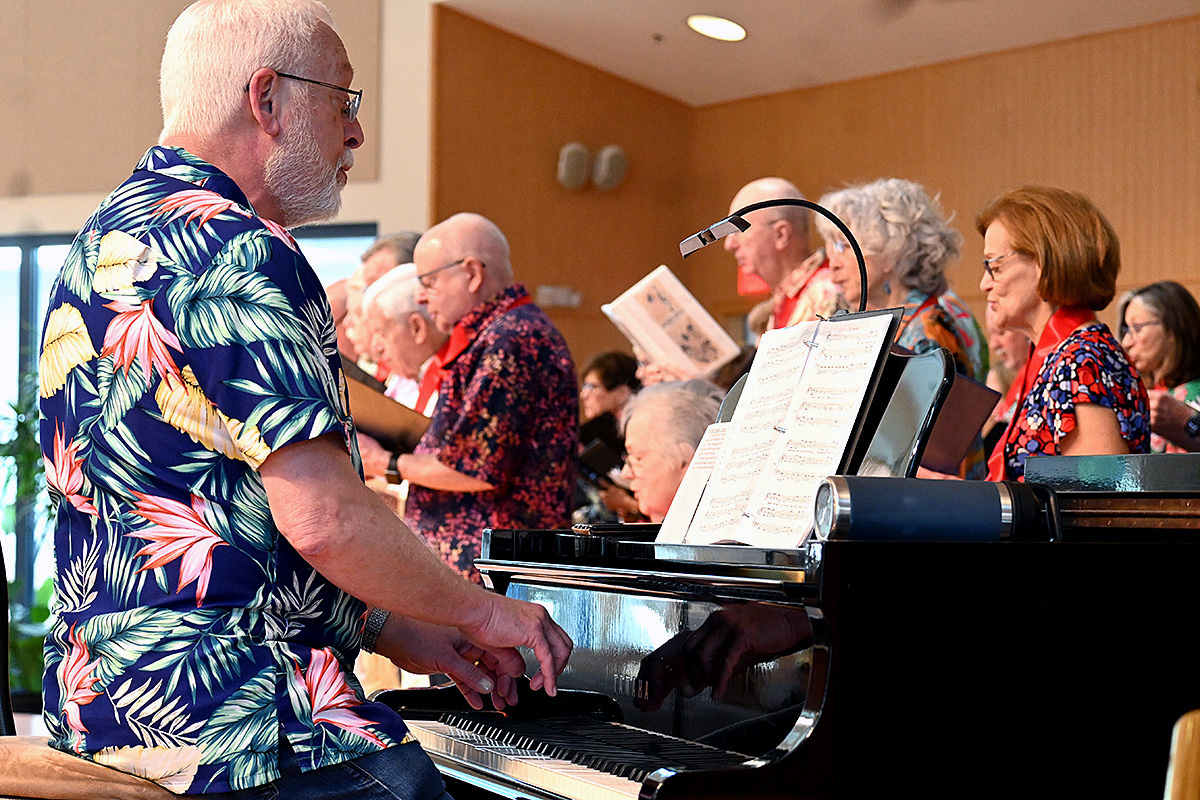 Doug Yetter (left), director of music at Epworth United Methodist Church in Rehoboth Beach, Del., accompanies the Parkinson’s Education and Support Group of Sussex County Choir during its performance April 10 at the church. Keeping active though singing and other physical activity can hold off progression of the disease. Photo by Jim Patterson, UM News. 