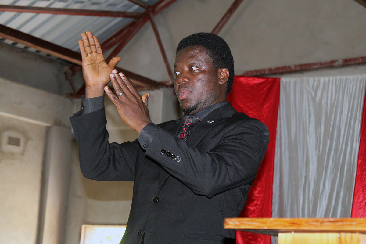 Collins Kwasi Prempeh preaches at King Solomon United Methodist Church in Mutare, Zimbabwe, on May 18. Prempeh, the first Deaf Global Missionary, will work with communities in Zimbabwe, Tanzania, Burundi, Zambia, Congo and other parts of East Africa for the next three years. Photo by Kudzai Chingwe, UM News.