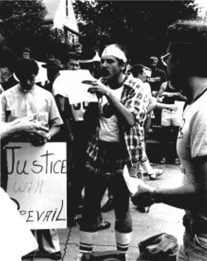 The Rev. Dr. Richard Huskey, a life-long United Methodist and advocate for LGBTQ rights, is shown at a 1977 rally to support an ordinance that banned discrimination in employment and housing in St. Paul, Minn. It’s the photo that Huskey selected to represent his time in ministry. He died June 15 at age 75. Photo courtesy of Huskey.