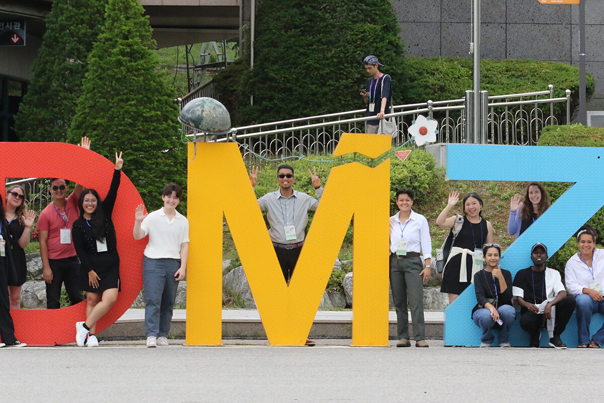 Young adults pose for a photo during a visit to the Demilitarized Zone in Paju, Korea, on June 24. The group traveled from 15 countries to participate in the 2025 Young Adults Pilgrimage of Peace in South Korea, organized in part by United Methodists. Photo by the Rev. Thomas E. Kim, UM News. 