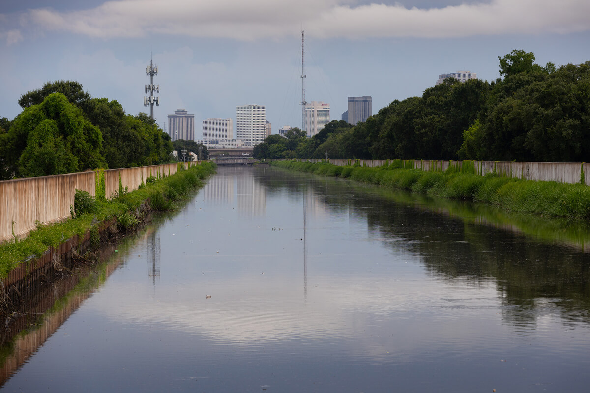 Downtown New Orleans is visible in the background along the London Street Canal. A section of the flood wall was breached during Hurricane Katrina, flooding the Gentilly neighborhood and nearby United Methodist-related Dillard University. Photo by Mike DuBose, UM News.