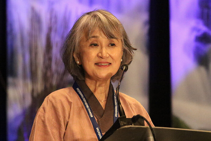 On June 11, 2025, the Rev. KyungHae Shin shares her reflections at the Northern Illinois Annual Conference clergy retirement celebration service. Photo by the Rev. Thomas E. Kim, UM News.