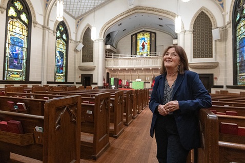 The Rev. Callie Winn Crawford describes the process of reopening and restoring Rayne Memorial United Methodist Church in New Orleans after Hurricane Katrina struck in 2005, sending the 60-foot steeple crashing through the roof. Crawford said the church hosted volunteer teams for almost three years. Photo by Mike DuBose, UM News.